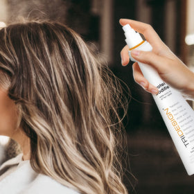 TRI Design Protein Bodifier-lift-focused-hair at crown after application.