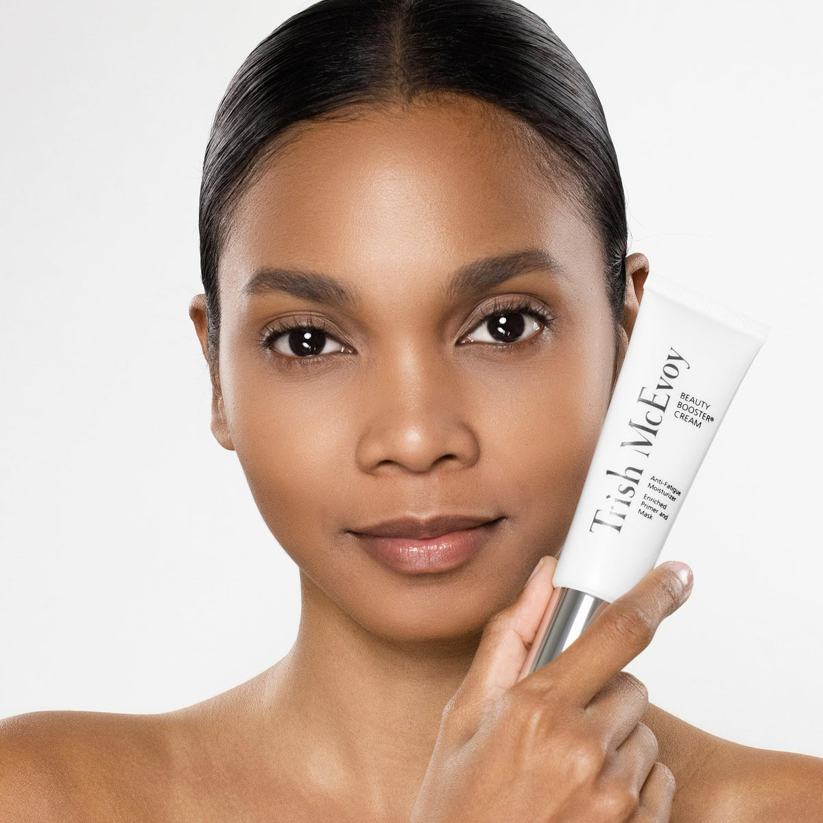 Trish McEvoy Beauty Booster Cream texture closeup emphasizes radiant finish.