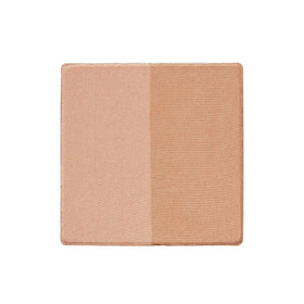 Trish McEvoy Dual Resort Bronzer Refill close-up on the sleek compact for easy touch-ups