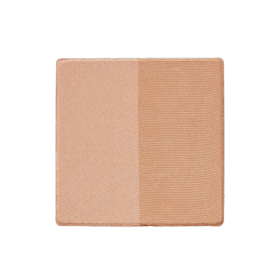 Trish McEvoy Dual Resort Bronzer Refill close-up on the sleek compact for easy touch-ups