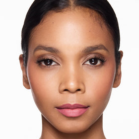 Trish McEvoy Essential Pencil Lip Crayon nude on dresser ready for daily touch-ups