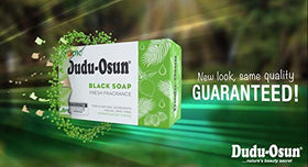 Tropical Naturals Dudu Osun African Black Soap Original bar on sink illustrates natural care.
