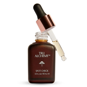 Tru Alchemy Spot Check bottle pour showing easy dispensing for daily use