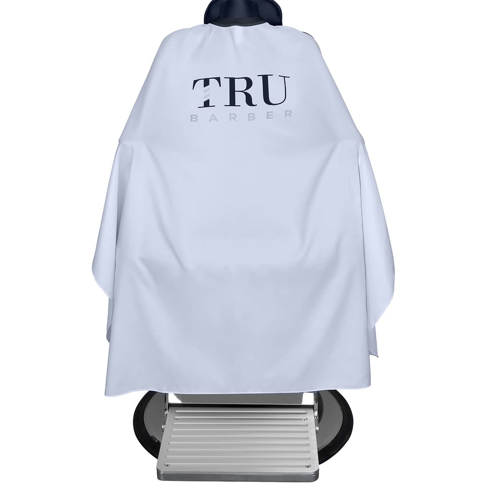 TRU BARBER cutting cape with silicone neck collar provides comfortable protection during haircuts.