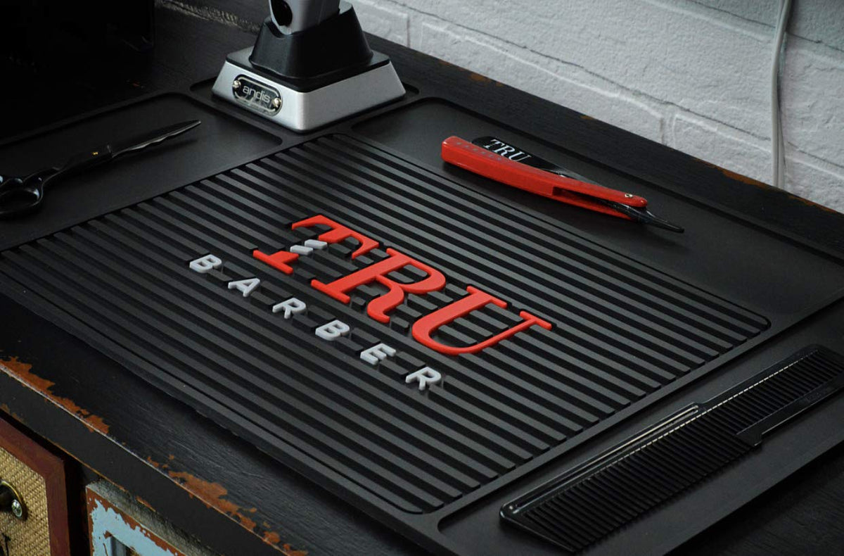 TRU BARBER Organizer Mat easy-clean surface for quick wipe downs after spills.