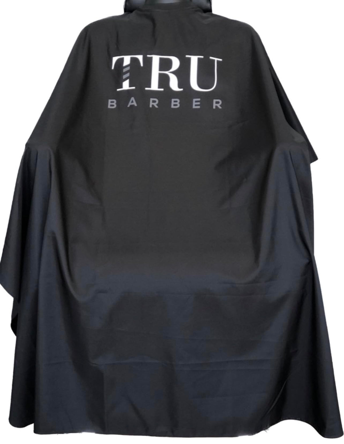 TRU BARBER silicone neck cape close-up showing comfortable neck seal and water protection