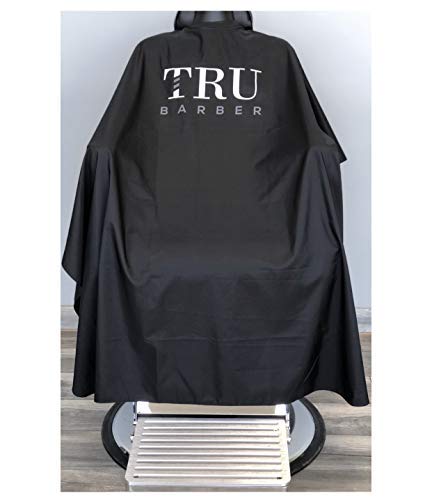 TRU BARBER silicone neck cape full view demonstrates 50 by 58 inches of lightweight fabric