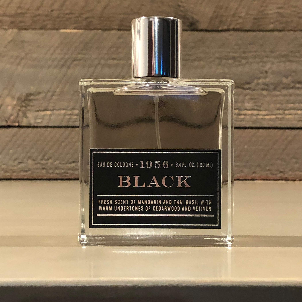 1956 Black bottle back shows minimalist branding and durable design
