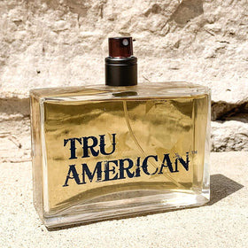 Tru Fragrance Beauty American Men's Cologne label detail emphasizes rugged branding.