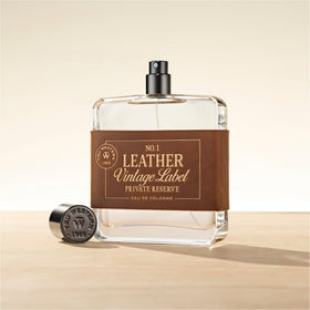 Tru Fragrance Leather No. 1 packaging close-up highlighting small batch heritage.