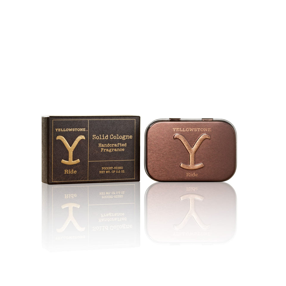 Tru Fragrance Beauty Yellowstone Ride solid cologne tin front for travel-ready packaging.