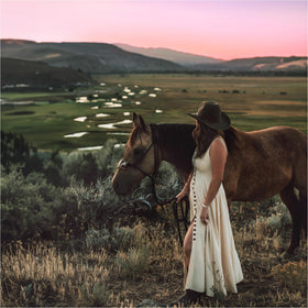 Tru Western Yellowstone Dusk vanilla orchid warmth enhances intimate moments.