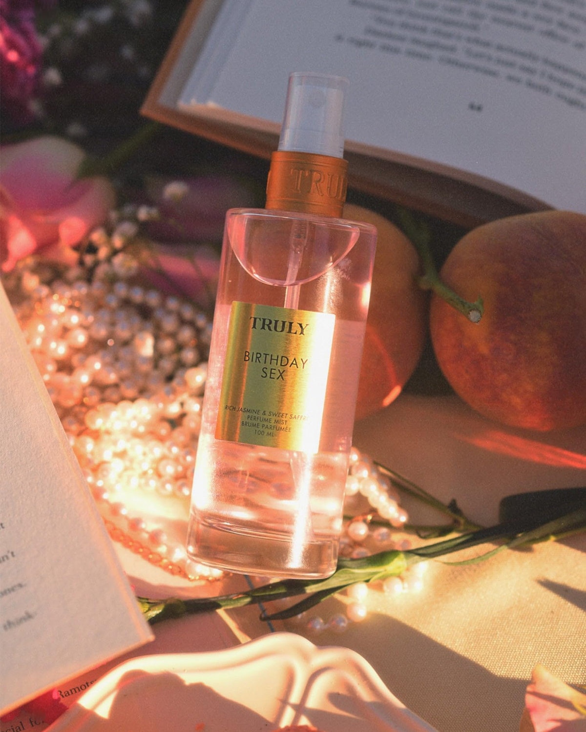 Truly Birthday Sex perfume mist with saffron adds warm glow for cozy moments.