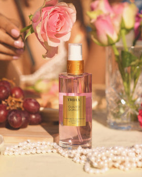 Truly Glazed Donut Perfume Mist application shot highlights soft, layered gourmand scent.