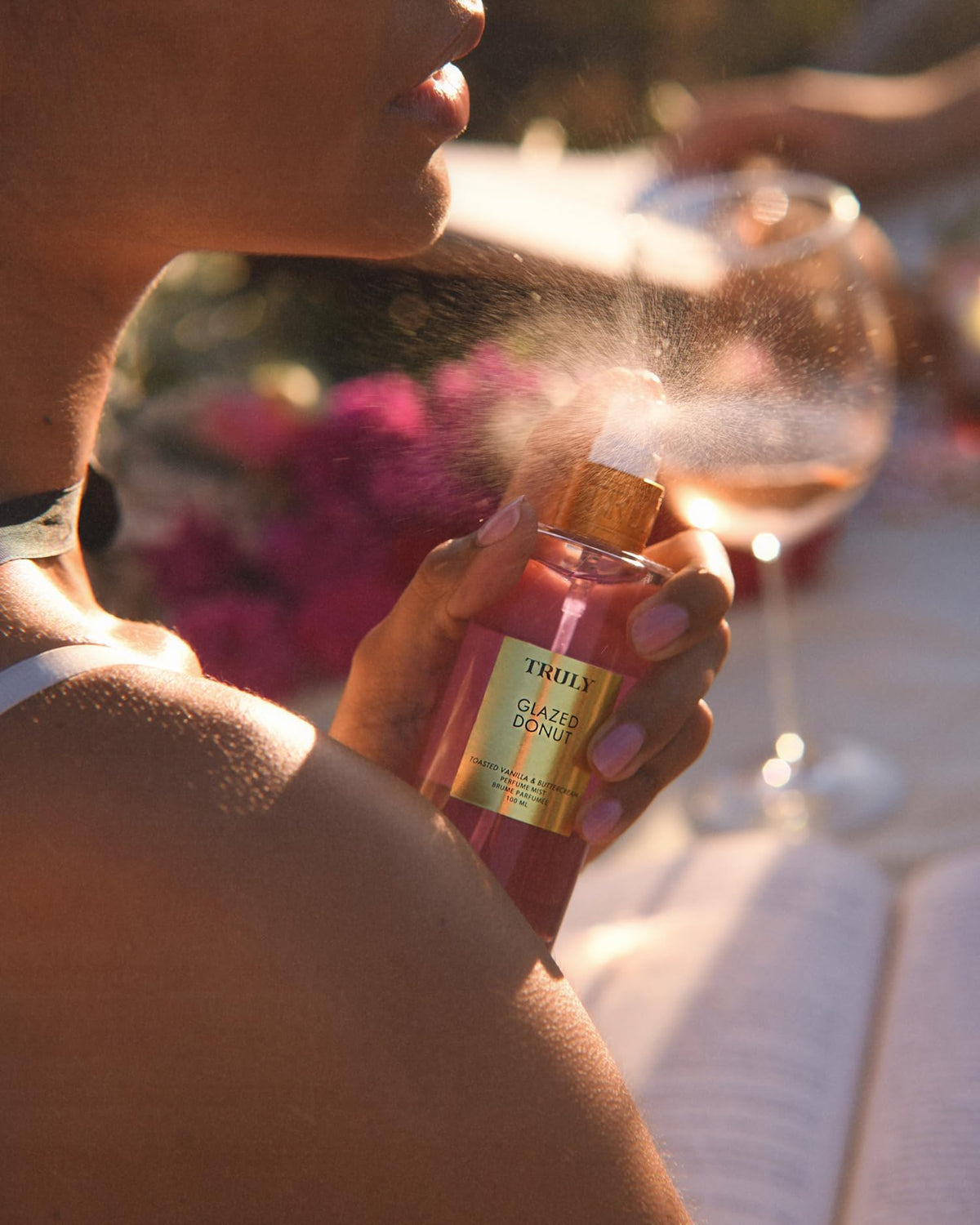 Truly Glazed Donut Perfume Mist close-up label conveys branding and fragrance notes.