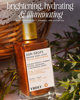 Truly Sun Drops glow on skin all tones showcases warm, non-greasy shimmer.