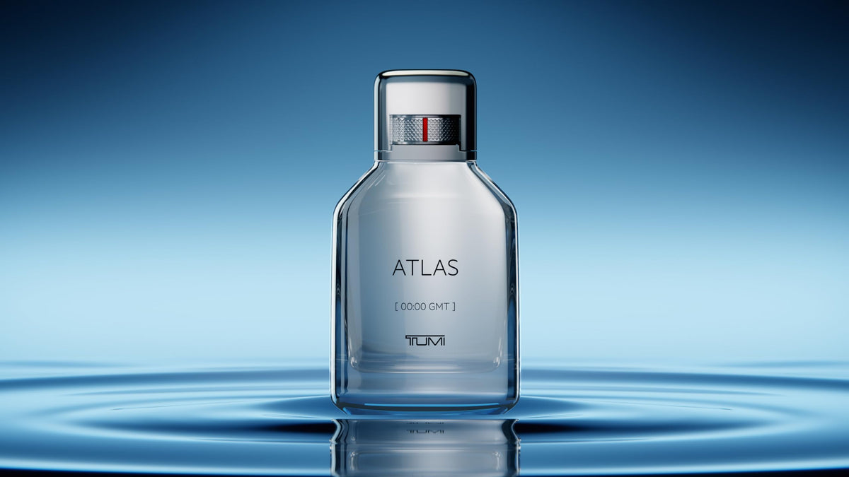 Tumi Atlas bottle pour, suggesting easy, lasting fragrance