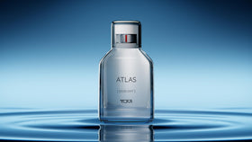 Tumi Atlas bottle pour, suggesting easy, lasting fragrance