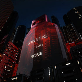 Tumi Kinetic spray action showing even fragrance distribution.