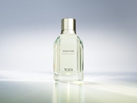 TUMI Signature Experience Collector bottle tilted to showcase sleek aesthetic