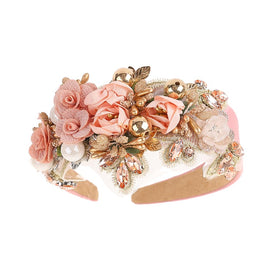 TURTLEDOVE Baroque rhinestone floral headband in pink adds bridal sparkle for the wedding day.