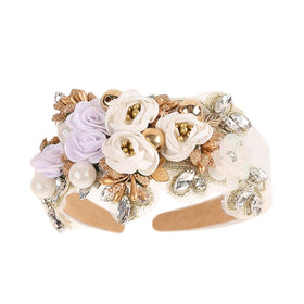 TURTLEDOVE Baroque rhinestone floral headband with crystals for bridal sparkle.