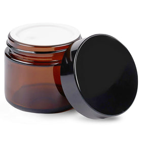 TUZAZO 2oz amber glass jar with black lid provides a tight seal for cosmetics.
