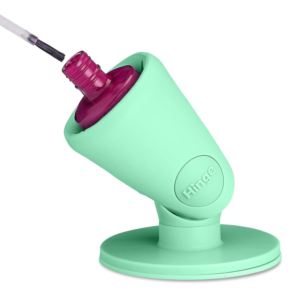Tweexy Hinge untippable bottle holder keeps polish upright for mess-free application.