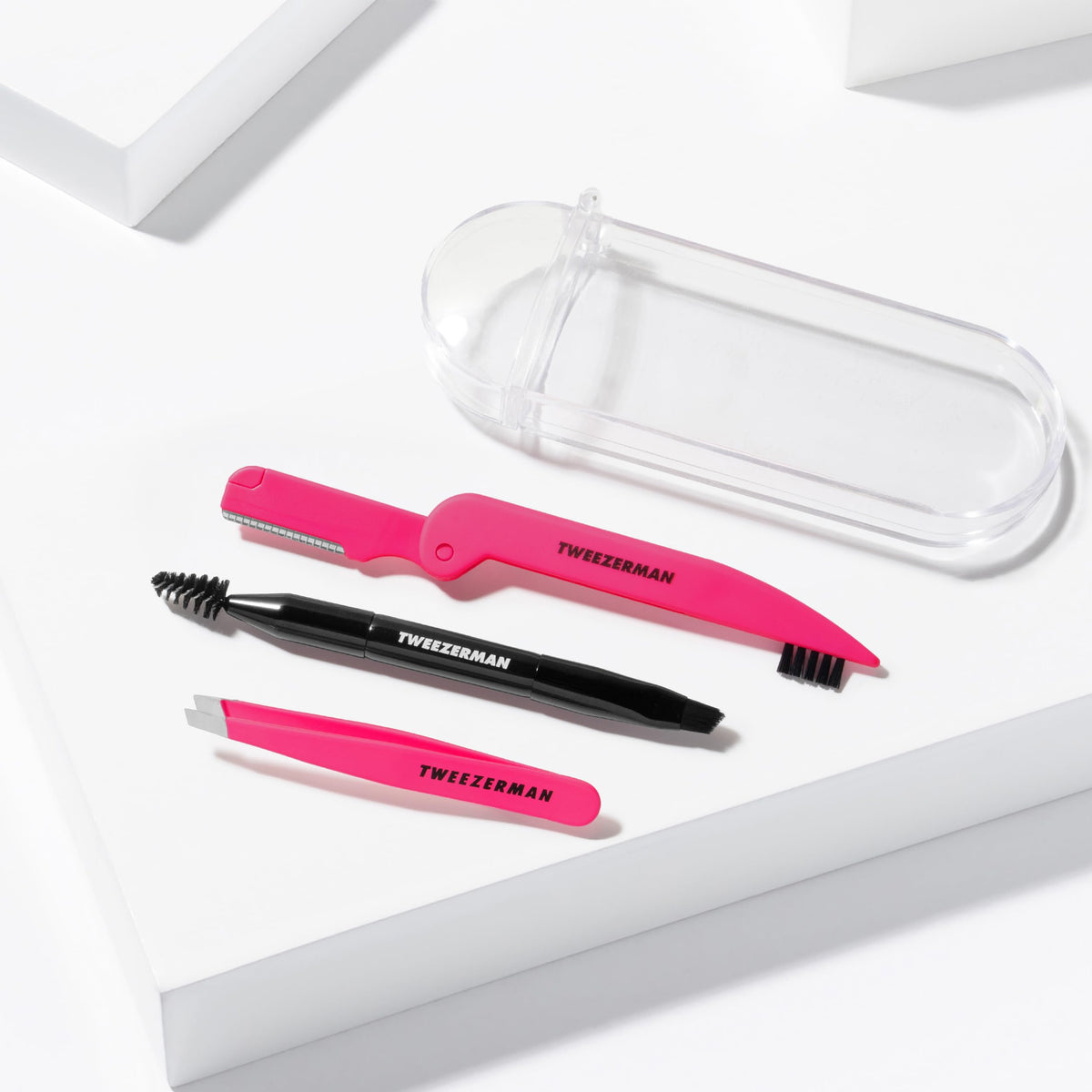 Open Tweezerman brow rescue kit showing organized tools