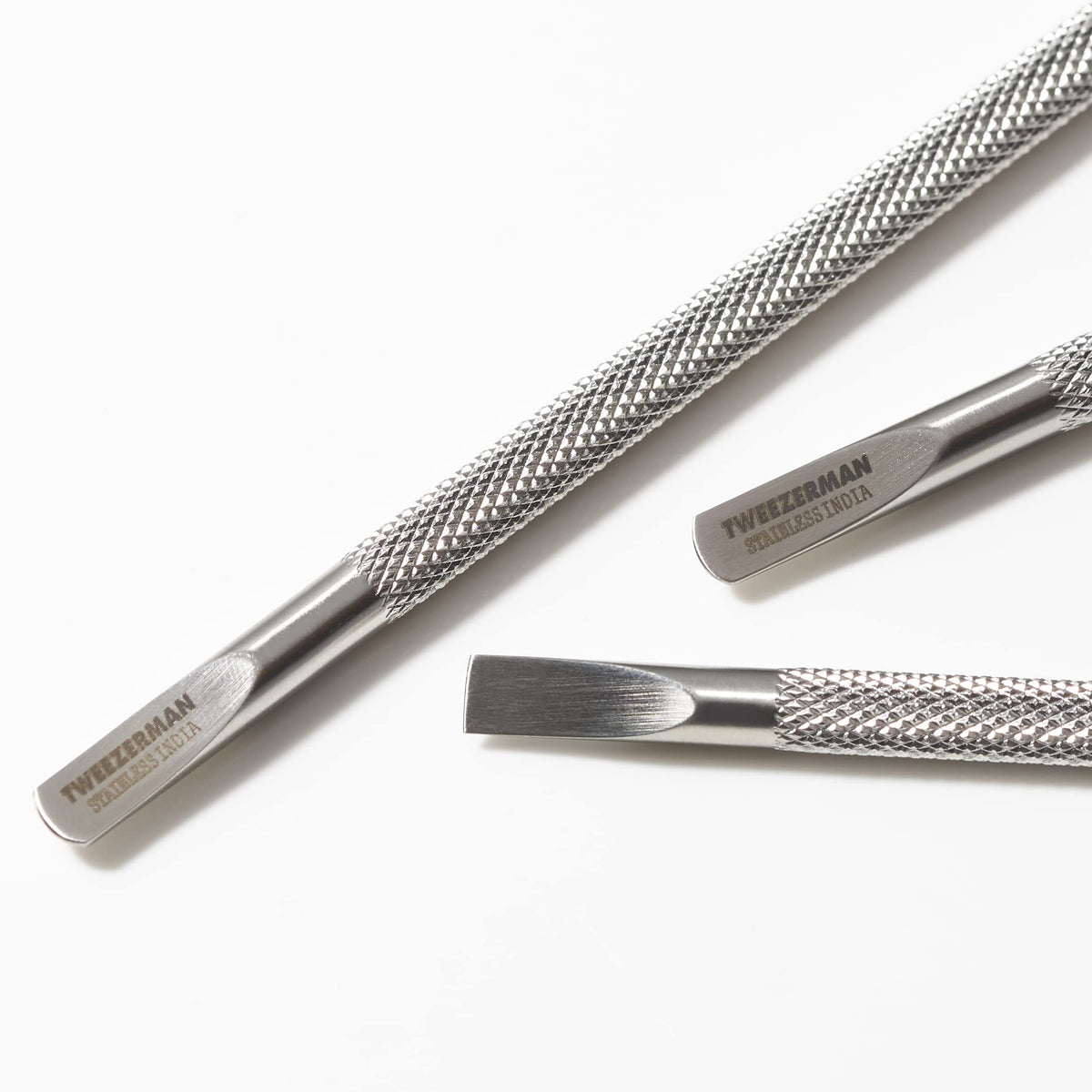 Tweezerman Cuticle Pushy flat edge safely pushes back cuticles.