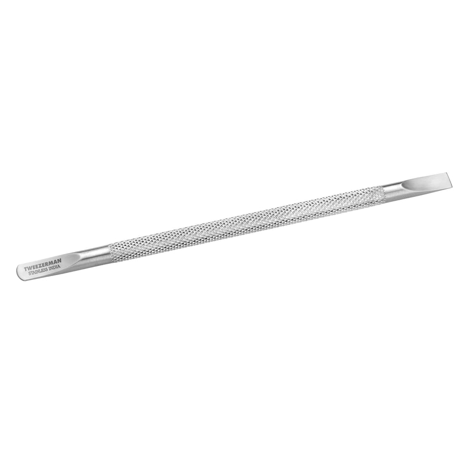 Tweezerman Cuticle Pushy nail cleaner in stainless steel for precise cuticle work.