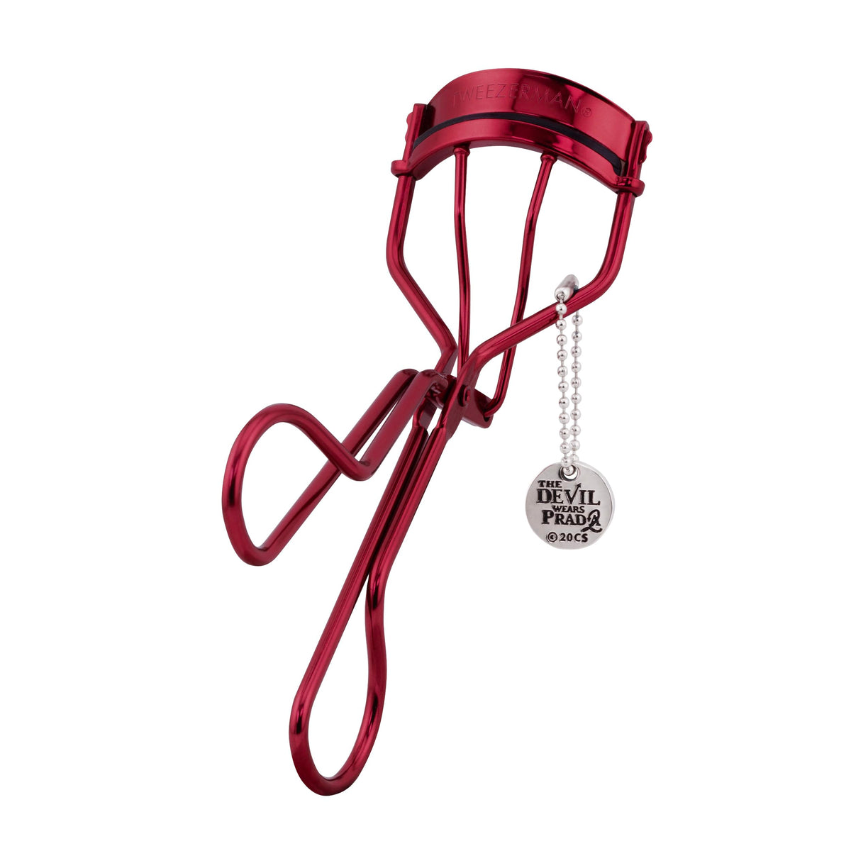 Tweezerman Devil Wears Prada 2 Lash Curler close-up showing ergonomic handle for precise curling.