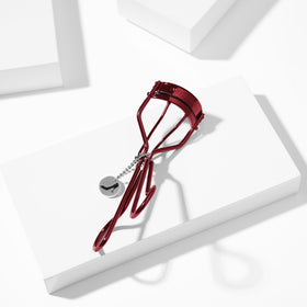 Tweezerman Devil Wears Prada 2 packaging highlights premium design and care tips.