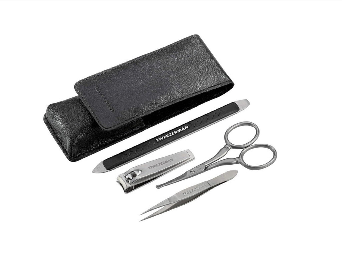 Tweezerman Essential Grooming Kit for Men case and tools ready for travel.