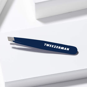 Tweezerman Evening Blue Mini Slant Tweezer close up of hand filed tips.