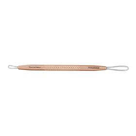 Tweezerman Rose Gold No Slip Skin Care Tool dual-sided design for safe pore extraction.