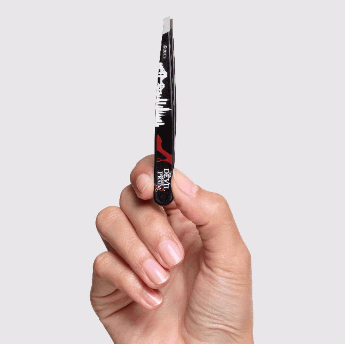 Tweezerman slant tweezer at 25-degree angle for precise brow hair removal.