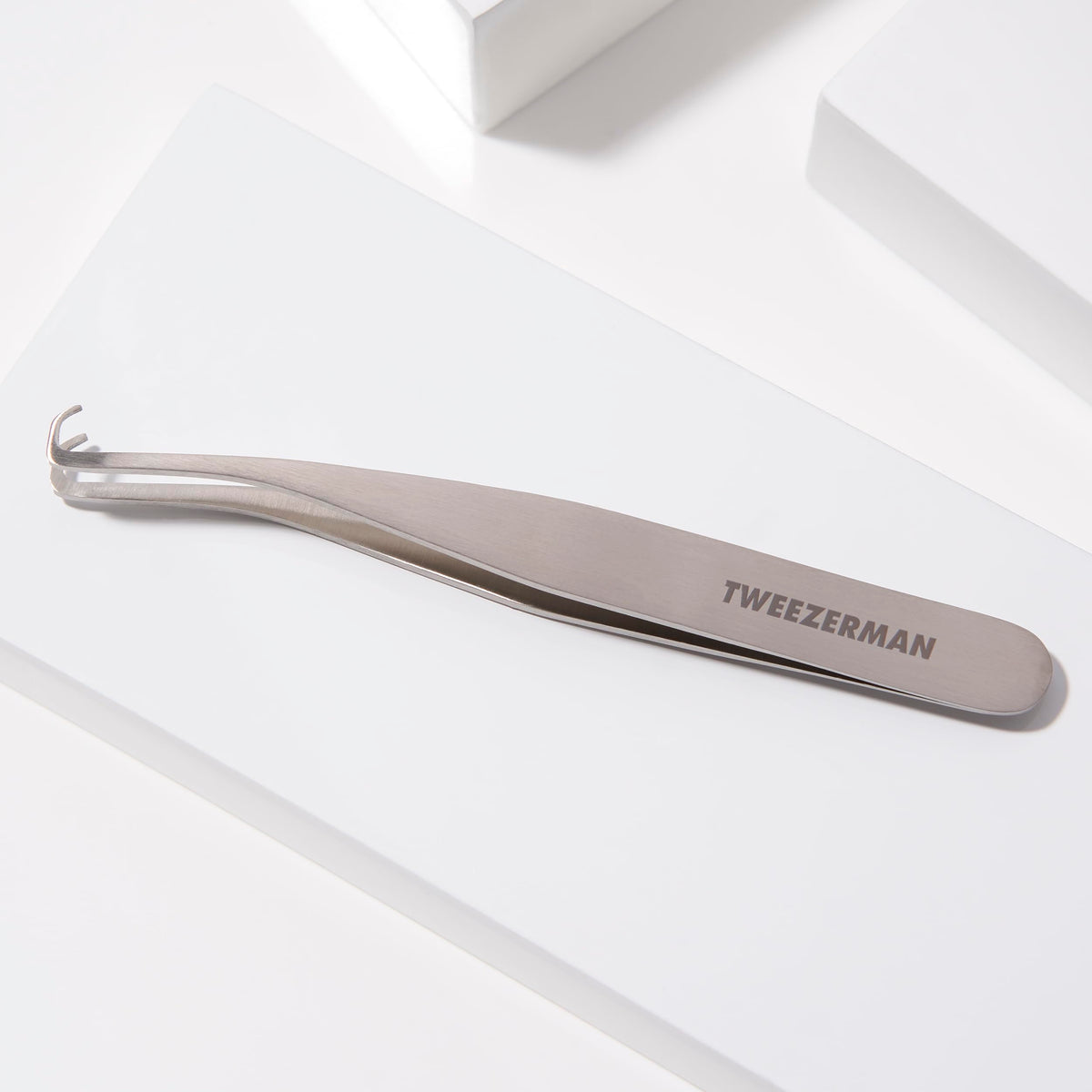Stainless steel Tweezerman tool demonstrates durability and easy cleaning