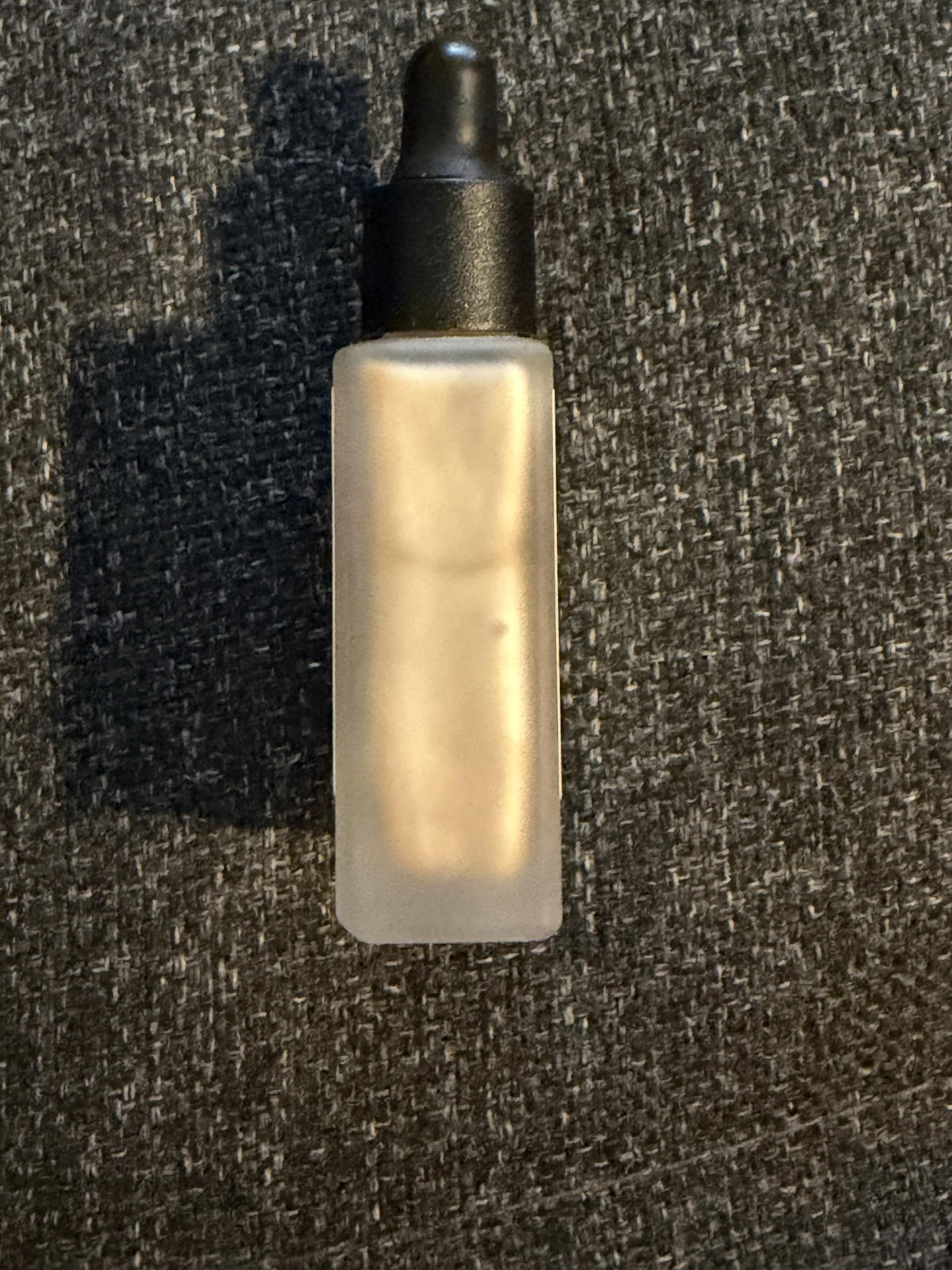 Typology Paris Glow Drops on skin demonstrating natural, blendable glow
