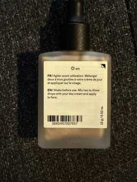 Typology Paris Glow Drops texture close-up highlighting lightweight serum consistency