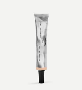 Typology tinted concealer Type 2 in light bottle provides coverage for under-eye areas.