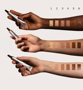 Typology concealer Type 2 light swatches show blendable coverage for blemishes.