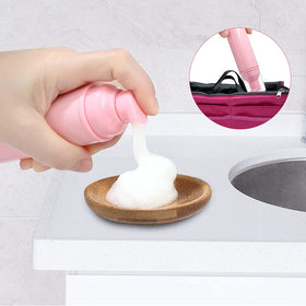 Tzirci lash-shampoo bottle demonstrating the foaming dispenser.