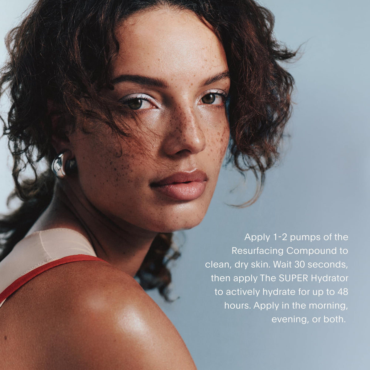 Close-up of serum blend pump showing nourishing oils and peptides