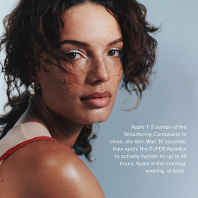 Close-up of serum blend pump showing nourishing oils and peptides