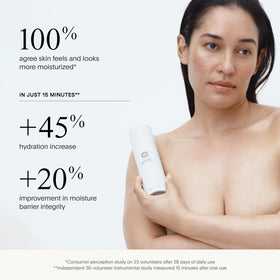 Hands applying U Beauty The SUPER Body Hydrator to dry skin.