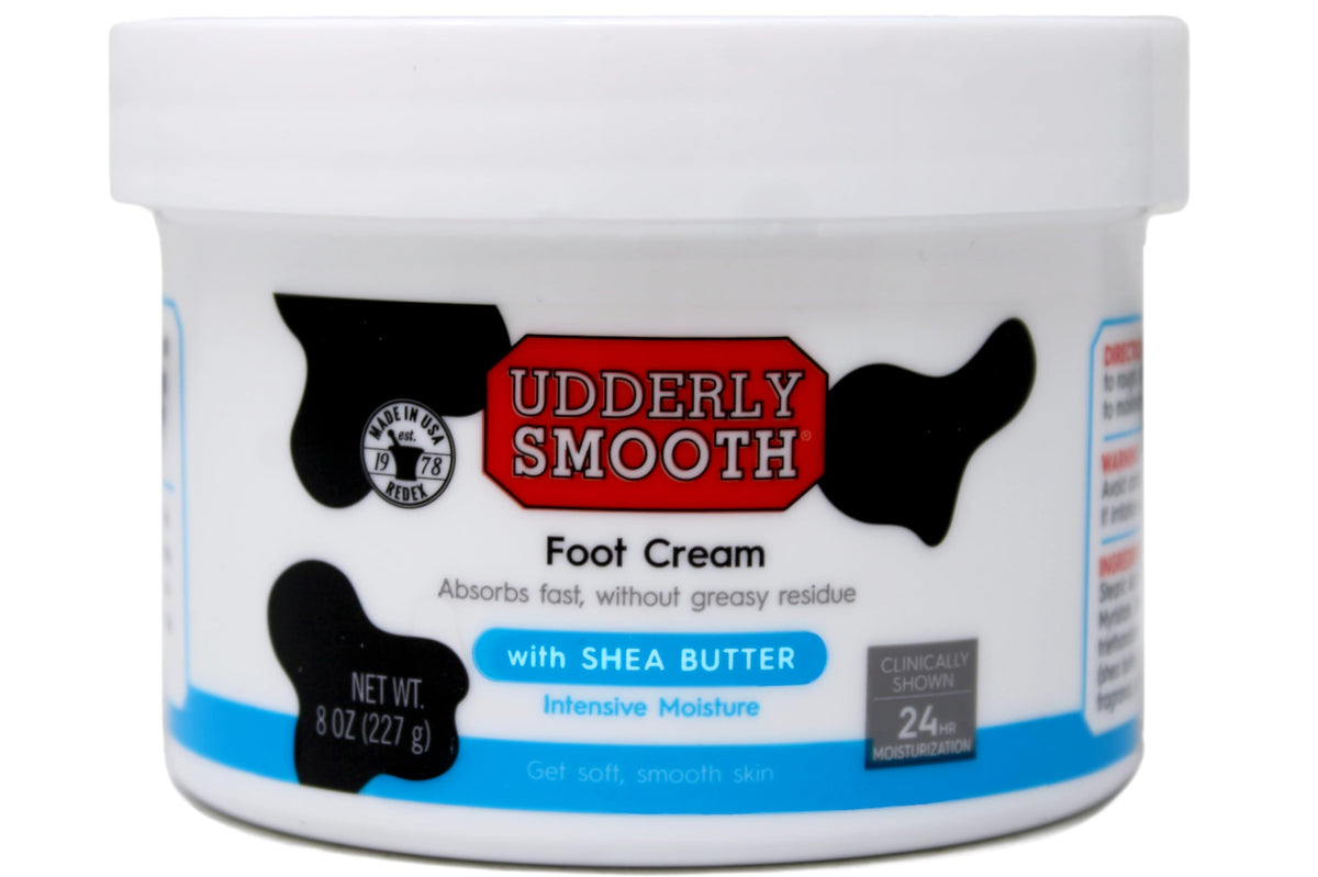 Udderly Smooth foot cream tube closeup shows Shea Butter formula for soft feet