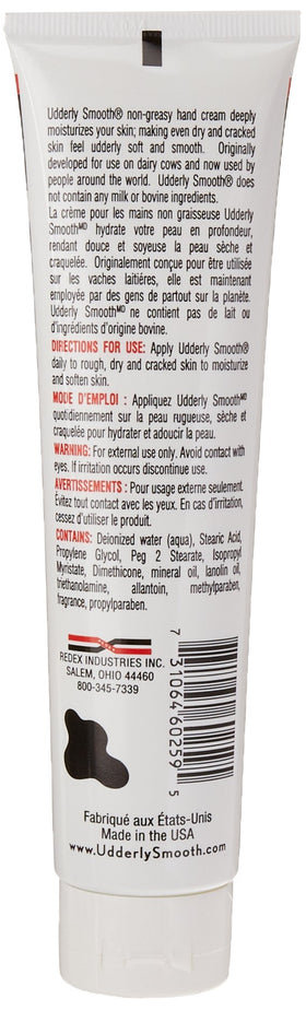 Close-up of applying Udderly Smooth hand cream for fast-absorbing hydration.