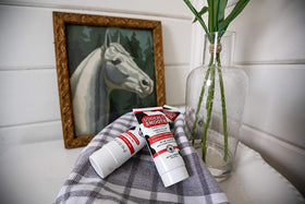 Udderly Smooth Hand Cream label detail highlights the classic formula.
