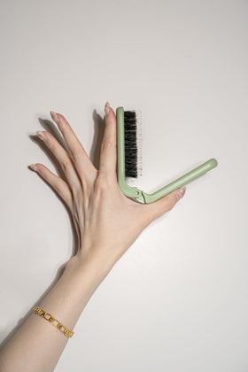 Uffy MiniPop mint-green sleek finish adds playful style.
